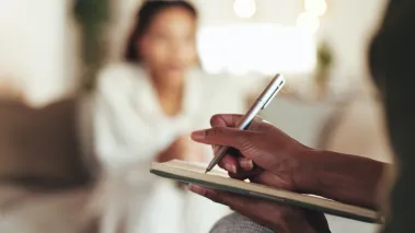 Therapist taking notes