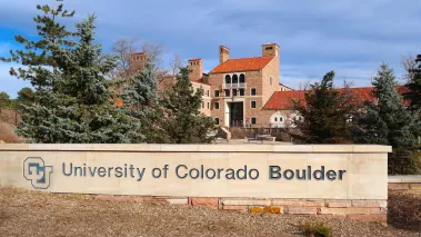 University of Colorado Boulder sign in front of Memorial Center (Image via Shutterstock.com)