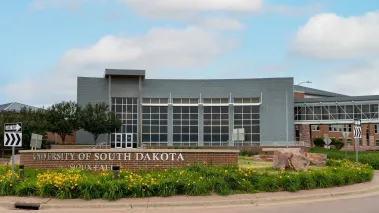 University of South Dakota entrance sign in Sioux Falls (Image via Shutterstock)