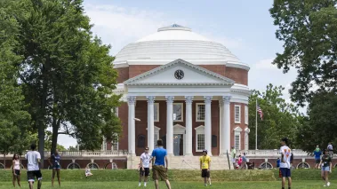 Students play in front of The Rotunda at the University of Virginia in 2017 (Image via Shutterstock.com)