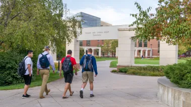 Students walk on the campus of the University of Nebraska in Lincoln (Image via Shutterstock.com)