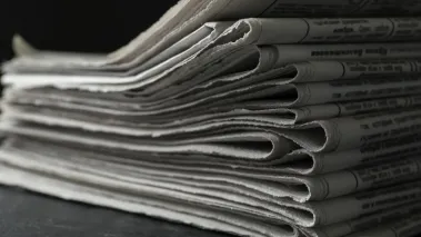 a stack of newspapers