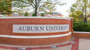 Auburn University sign on campus in Alabama (Image via Shutterstock.com)