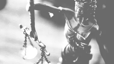 Cover of law faculty survey report showing a statue of justice wearing a blindfold.