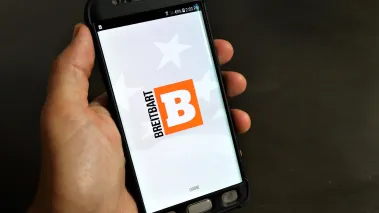 Breitbart News website logo on smartphone (Image via Shutterstock.com)