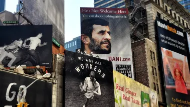 Billboards cover facades and roofs of buildings on Broadway just north of Times Square including one featuring the face of Iran's President Mahmoud Ahmadinejad
