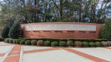 Entrance sign for the University of South Alabama in Mobile. (Image via Shutterstock.com)