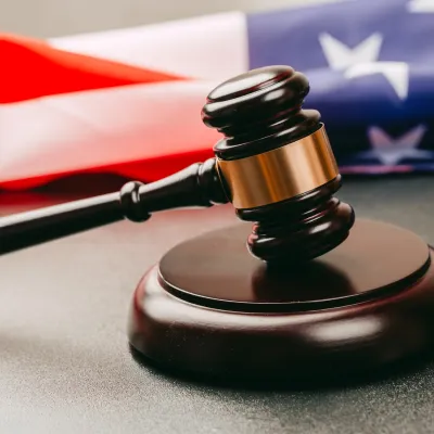 Judge gavel and background with American flag