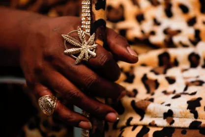 Hip-hop artist Afroman wearing marijuana leaf jewelry
