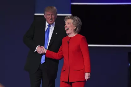 Hillary Clinton shakes hands with Donald Trump on stage at Hofstra University after the 2016 presidential debate