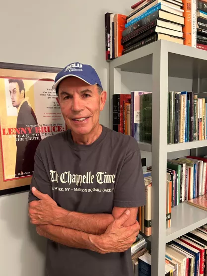 Ronald Collins wearing ACLU hat