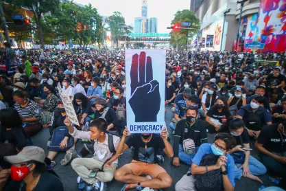 Tens of thousands of pro democracy people gather on Ratchapason Road in Bangkok, Thailand on Oct. 25, 2020, to address various social problems, including government work problems, and criticize the monarch