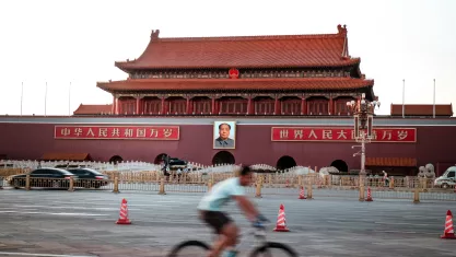 Famous Tiananmen Square in Beijing, China with view on Forbidden City and Mao Zedong picture at sunset