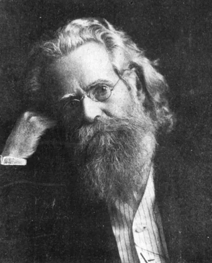 Black and white photo of Moses Harmon, who has a long beard and head tilted, resting on his fist.