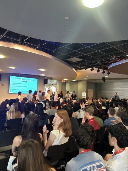 Students participate in a debate during Mike Culnan's presentation.