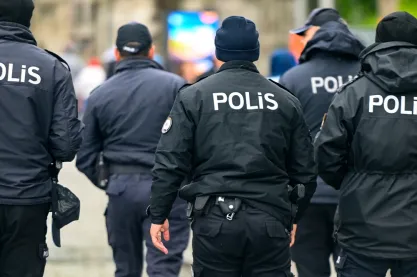 Group of Turkish police walking down street in Istanbul