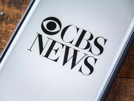 CBS News logo on a smartphone screen