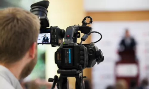 Camera operator framing a shot