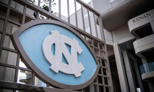 University of North Carolina logo on a gate