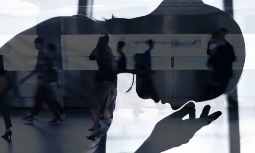 illustration of a woman's silhouette with her head down, feeling stressed out.