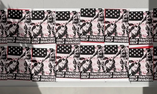 University Illinois Poster reading "Only Traitors Help Invaders"