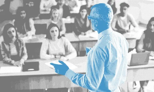 Black and white photo of students in a college lecture hall looking at a professor who is shaded blue.