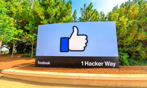 Thumbs up sign at entrance to Facebook headquarters in Menlo Park California (Image via Shutterstock.com)