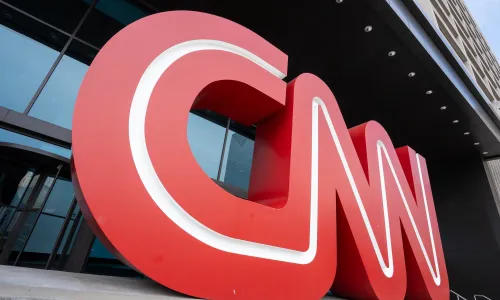 Closeup of the giant CNN logo seen at the main entrance to the CNN Center in Atlanta, Georgia. (Image via Shutterstock.com)