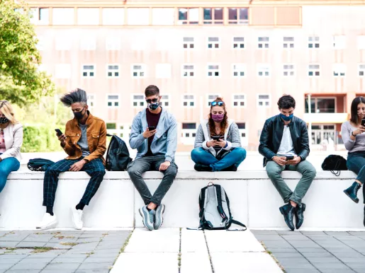 College students sitting on bench