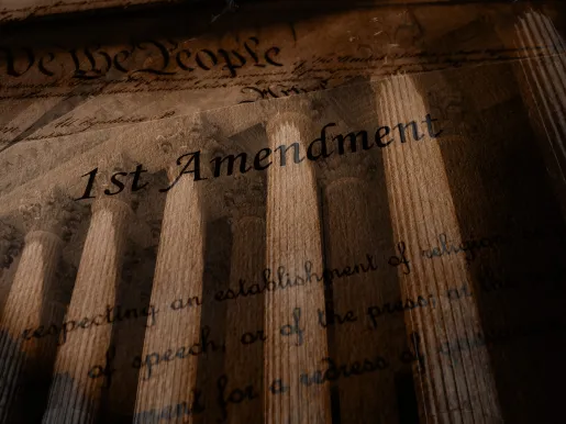 First Amendment text of the United States Constitution over the Supreme Court building