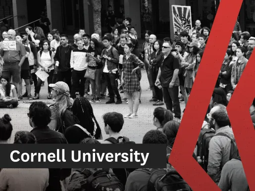 Black and white photo showing students and faculty protesting on a college lawn.