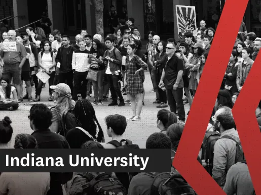 Black and white photo showing students and faculty protesting on a college lawn.