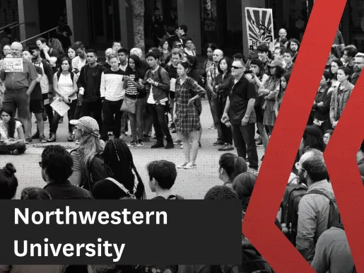 Black and white photo showing students and faculty protesting on a college lawn.