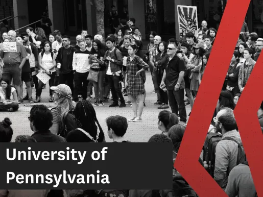 Black and white photo showing students and faculty protesting on a college lawn.