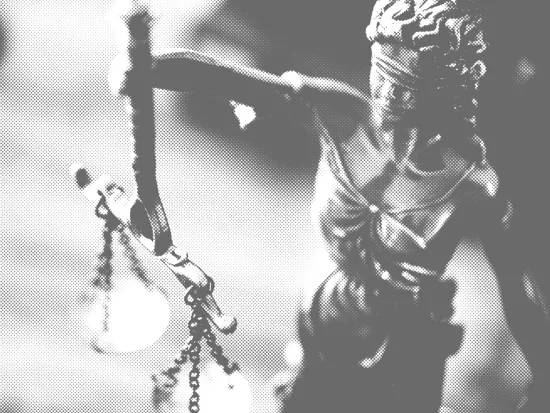 Cover of law faculty survey report showing a statue of justice wearing a blindfold.