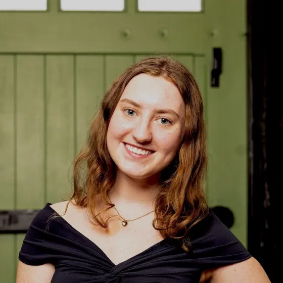 Headshot of Maggie Woods