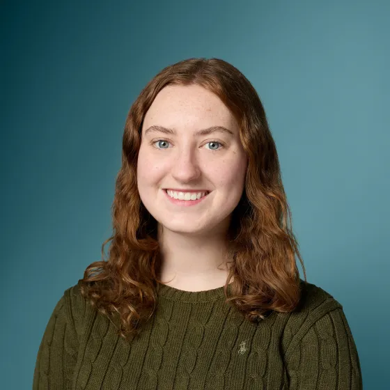 Headshot of Maggie Woods