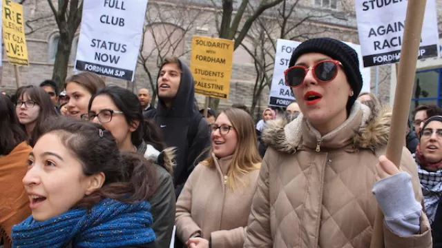 Members and supporters of Fordham Students for Justice in Palestine rallied on the university's Manhattan campus, before marching to nearby Columbus Circle and back, to protest the Fordham administration's refusal to register SJP as a student organization.