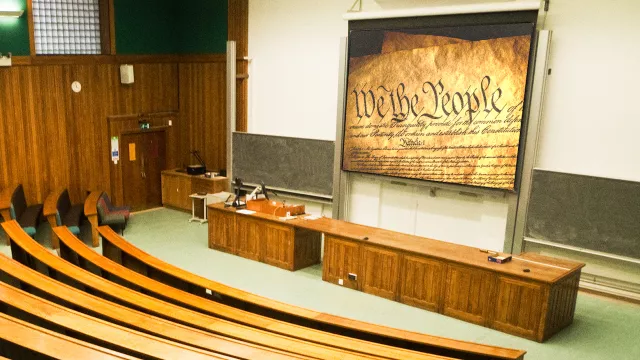 College classroom with the constitution on the projector screen 
