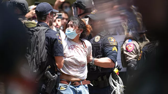 At the University of Texas at Austin on April 29, 2024, police arrest a protester at an encampment where students called attention to the war in Gaza.