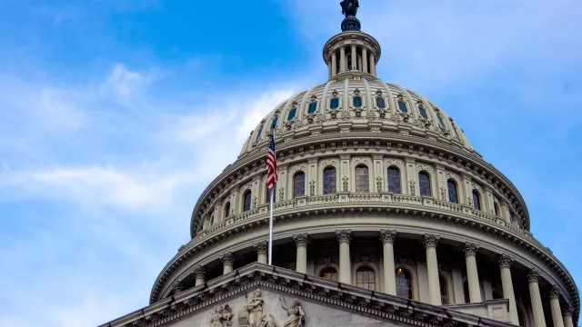 American flag on United States Capitol building