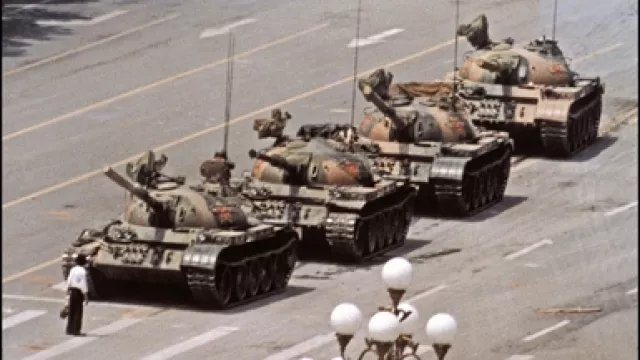 Tank Man temporarily stops the advance tanks on June 5 1989 in Beijing