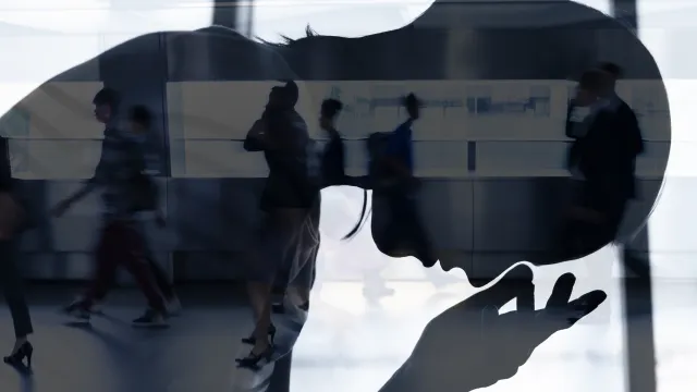 illustration of a woman's silhouette with her head down, feeling stressed out.