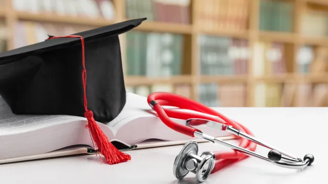 Stethoscope and graduate hat