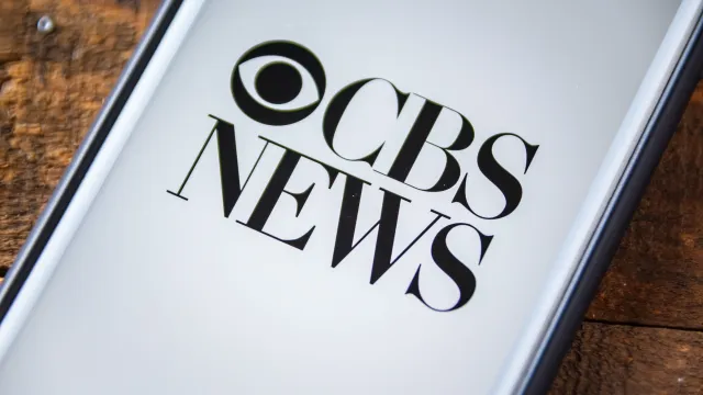 CBS News logo on a smartphone screen