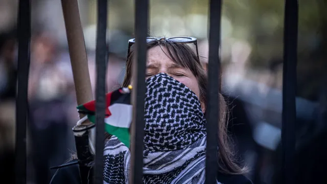 Columbia University student takes part in an anti-Israel protest inside the gates the school in Manhattan