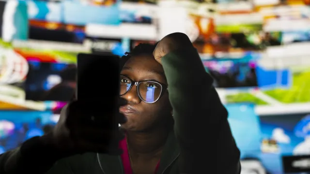 student using social media